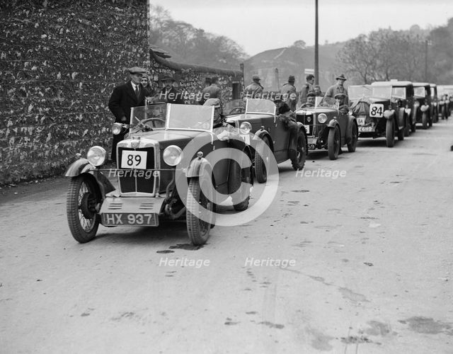 MG M type of EG Farrow at the head of a line of cars competing in the MCC Sporting Trial, 1930. Artist: Bill Brunell.