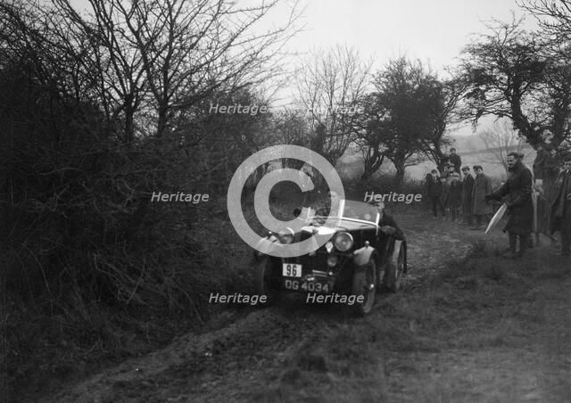 MG M type of GJ Rea at the Sunbac Colmore Trial, near Winchcombe, Gloucestershire, 1934. Artist: Bill Brunell.