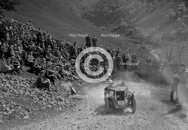 MG M type climbing a steep hill during a motoring trial, c1930s. Artist: Bill Brunell.