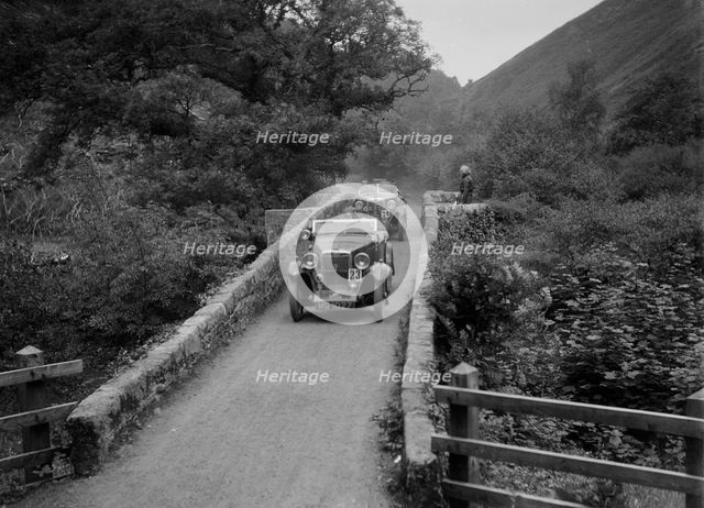 MG M type crossing Figle Bridge during a motoring trial, Devon, c1930s. Artist: Bill Brunell.