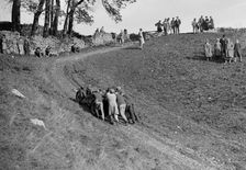 MG M type receiving a push up Litton Slack at the MCC Sporting Trial, Derbyshire, 1930. Artist: Bill Brunell