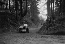 MG M Type standard 2-seater competing in the JCC Half-Day Trial, Hurtwood Hill, Surrey, 1930. Artist: Bill Brunell