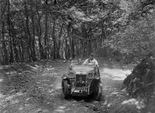 MG Magna competing in the B&HMC Brighton-Beer Trial, Fingle Bridge Hill, Devon, 1934. Artist: Bill Brunell