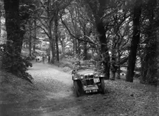 MG Magna competing in the B&HMC Brighton-Beer Trial, Fingle Bridge Hill, Devon, 1934. Artist: Bill Brunell