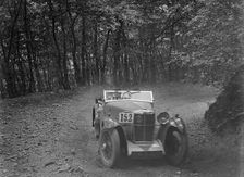 MG Magna competing in the B&HMC Brighton-Beer Trial, Fingle Bridge Hill, Devon, 1934. Artist: Bill Brunell