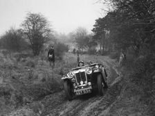 MG Magna of AJV Merritt at the Sunbac Colmore Trial, near Winchcombe, Gloucestershire, 1934. Artist: Bill Brunell