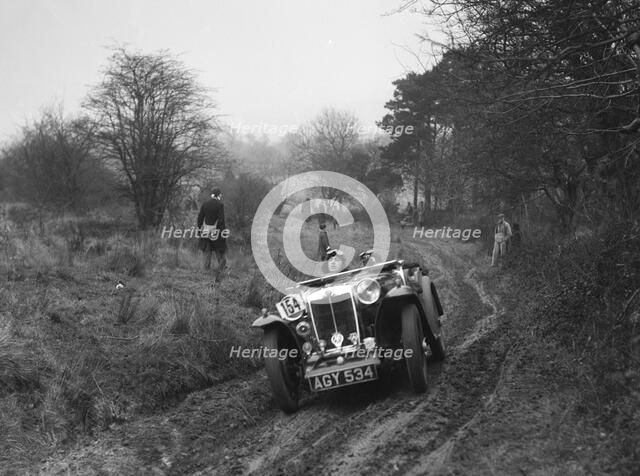 MG Magna of AJV Merritt at the Sunbac Colmore Trial, near Winchcombe, Gloucestershire, 1934. Artist: Bill Brunell.