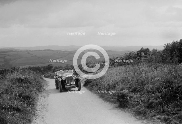 MG Magna of EG Burt competing in the MCC Torquay Rally, 1938. Artist: Bill Brunell.