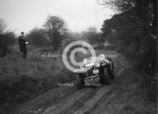 MG Magna of KC Delingpole at the Sunbac Colmore Trial, near Winchcombe, Gloucestershire, 1934. Artist: Bill Brunell.