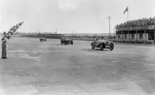 MG Magna of SG Cummings winning a race, BARC meeting, Brooklands, Surrey, 1933. Artist: Bill Brunell