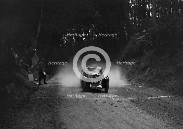 MG Magna taking part in a motoring trial, c1930s. Artist: Bill Brunell.
