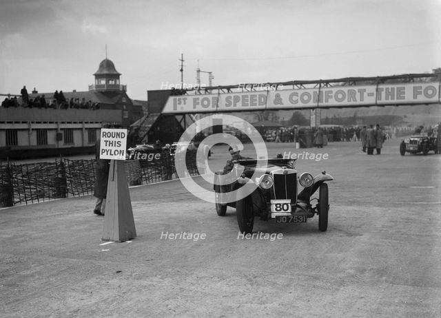 MG Magnette competing in the JCC Rally, Brooklands, Surrey, 1939. Artist: Bill Brunell.