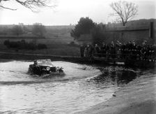 MG Magnette driving through a ford during a motoring trial, 1936. Artist: Bill Brunell