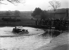 MG Magnette driving through a ford during a motoring trial, 1936. Artist: Bill Brunell