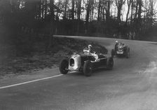 MG Magnette of AA Rigby leading JR Grice's Riley Brooklands at Donington Park, Leicestershire, 1935. Artist: Bill Brunell