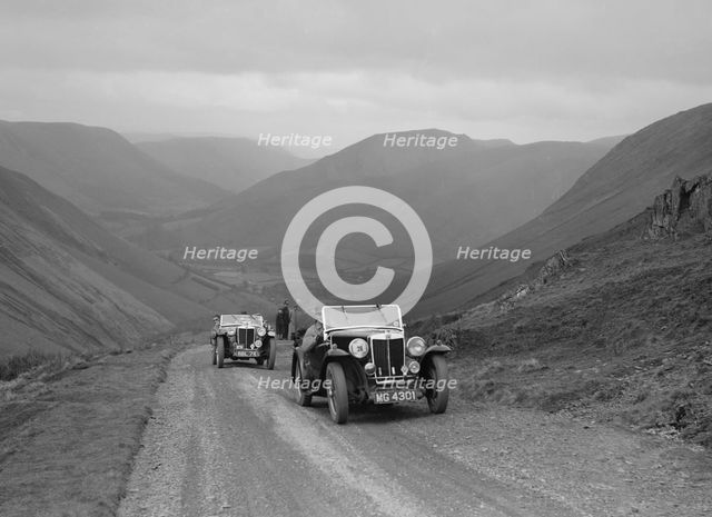 MG Magnette of WS Whittard and MG TA of Maurice Toulmin, MG Car Club Abingdon Trial/Rally, 1939. Artist: Bill Brunell.