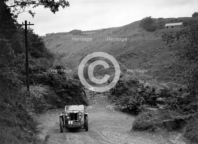 MG Magnette/Magna of the Three Musketeers team taking part in a motoring trial, Devon, late 1930s. Artist: Bill Brunell.