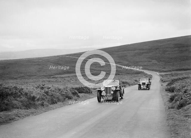MG Magnette NAs of VM Roberts and FE Ainley at the MCC Torquay Rally, July 1937. Artist: Bill Brunell.