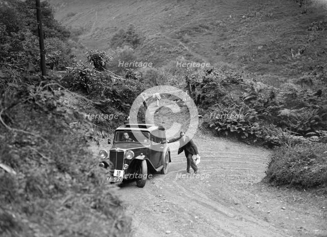 MG Magnette taking part in a motoring trial, late 1930s. Artist: Bill Brunell.