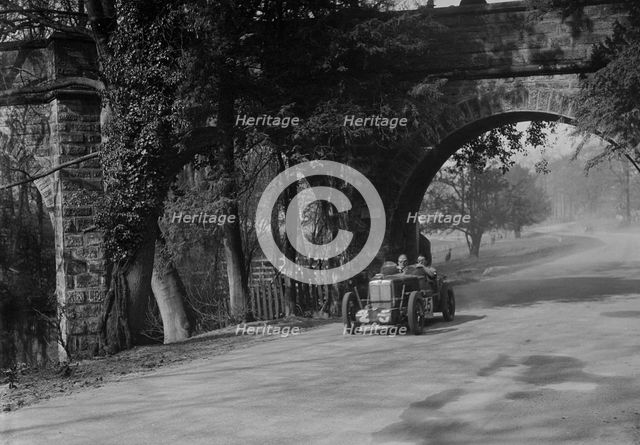 MG Midget of Eddie Hall at Starkey's Bridge, Donington Park, Leicestershire, 1933. Artist: Bill Brunell.