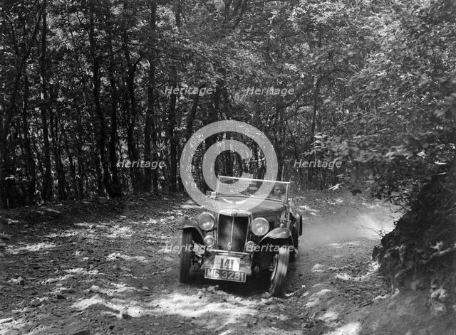 MG NA competing in the B&HMC Brighton-Beer Trial, Fingle Bridge Hill, Devon, 1934. Artist: Bill Brunell.