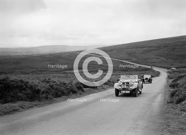 MG Shorey's Riley Lynx leading AL Baker's MG Magnette at the MCC Torquay Rally, July 1937. Artist: Bill Brunell.