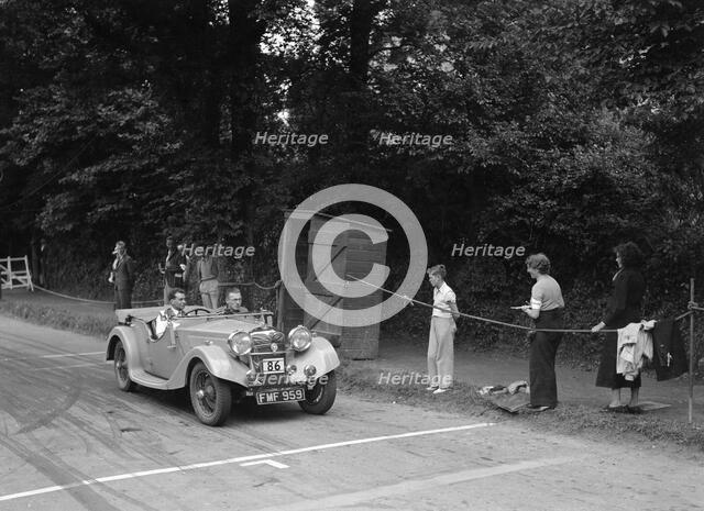 MG Shorey's Riley Lynx, winner of a bronze award at the MCC Torquay Rally, July 1937. Artist: Bill Brunell.