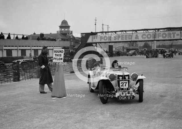 MG sports competing in the JCC Rally, Brooklands, Surrey, 1939. Artist: Bill Brunell.