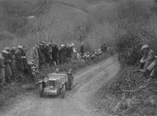 MG PA of Jack Bastock of the Cream Cracker Team competing in the MCC Lands End Trial, 1935. Artist: Bill Brunell