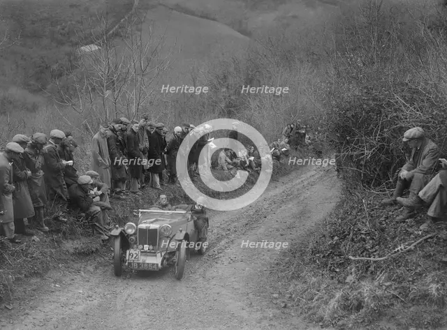 MG PA of Jack Bastock of the Cream Cracker Team competing in the MCC Lands End Trial, 1935. Artist: Bill Brunell.
