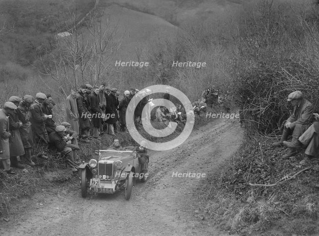 MG PA of Jack Bastock of the Cream Cracker Team competing in the MCC Lands End Trial, 1935. Artist: Bill Brunell.