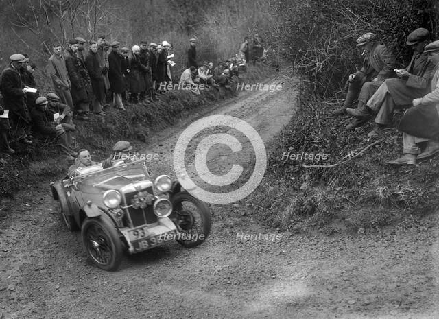 MG PA of RA MacDermid of the Cream Cracker Team competing in the MCC Lands End Trial, 1935. Artist: Bill Brunell.