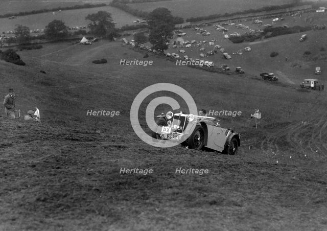 MG PA of the Cream Cracker team competing in the MG Car Club Rushmere Hillclimb, Shropshire, 1935. Artist: Bill Brunell.