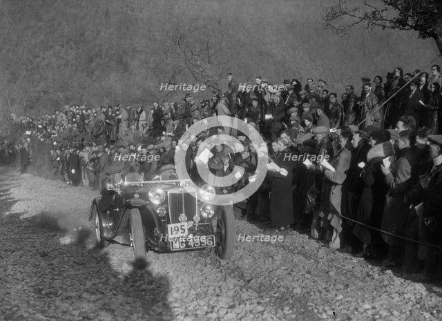 MG PB of FCN Day competing in the MCC Lands End Trial, Beggars Roost, Devon, 1936. Artist: Bill Brunell.