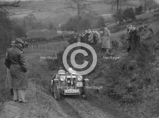 MG PB of J Terras competing in the MG Car Club Midland Centre Trial, 1938. Artist: Bill Brunell.