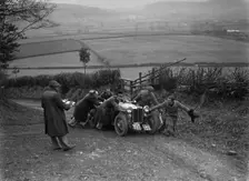 MG PB of K Scales getting a push during the MG Car Club Midland Centre Trial, 1938. Artist: Bill Brunell