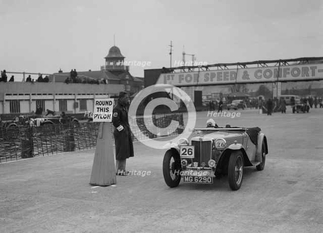 MG TA competing in the JCC Rally, Brooklands, Surrey, 1939. Artist: Bill Brunell.