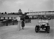 MG TA competing in the JCC Rally, Brooklands, Surrey, 1939. Artist: Bill Brunell