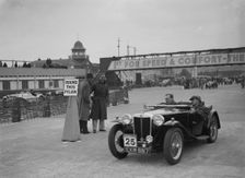 MG TA competing in the JCC Rally, Brooklands, Surrey, 1939. Artist: Bill Brunell