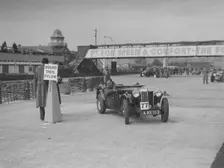 MG TA competing in the JCC Rally, Brooklands, Surrey, 1939. Artist: Bill Brunell