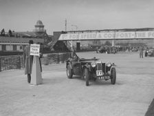 MG TA competing in the JCC Rally, Brooklands, Surrey, 1939. Artist: Bill Brunell
