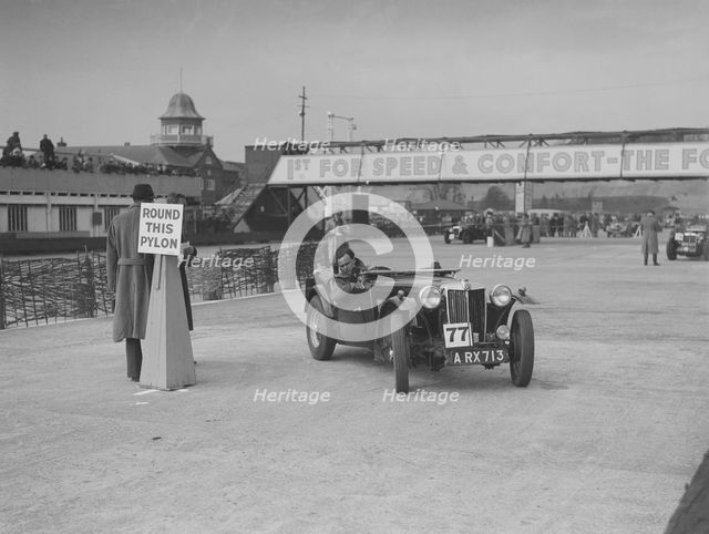 MG TA competing in the JCC Rally, Brooklands, Surrey, 1939. Artist: Bill Brunell.