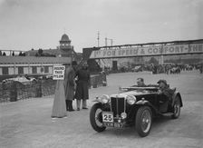 MG TA competing in the JCC Rally, Brooklands, Surrey, 1939. Artist: Bill Brunell