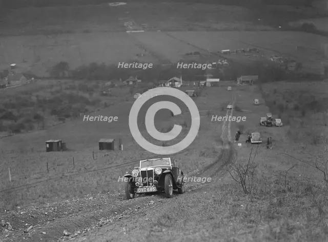 MG TA competing in the London Motor Club Coventry Cup Trial, Knatts Hill, Kent, 1938. Artist: Bill Brunell.