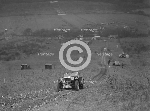 MG TA competing in the London Motor Club Coventry Cup Trial, Knatts Hill, Kent, 1938. Artist: Bill Brunell.