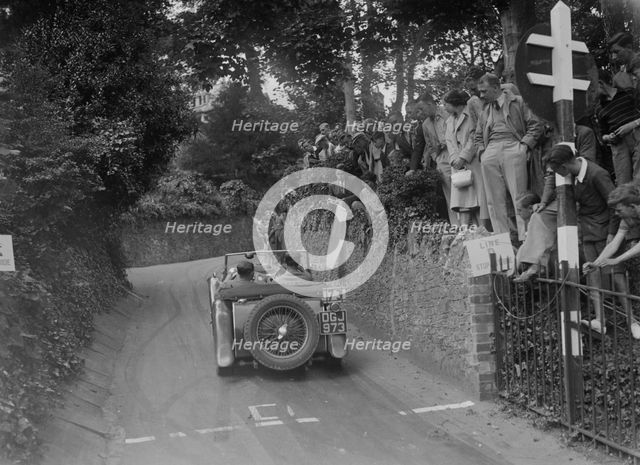 MG TA of CG Gibbs competing in the MCC Torquay Rally, 1938. Artist: Bill Brunell.