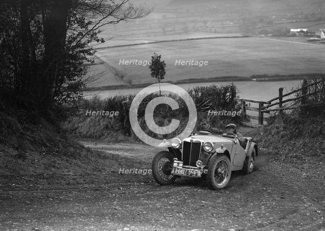 MG TA of Ken Crawford of the Cream Cracker Team at the MG Car Club Midland Centre Trial, 1938. Artist: Bill Brunell.