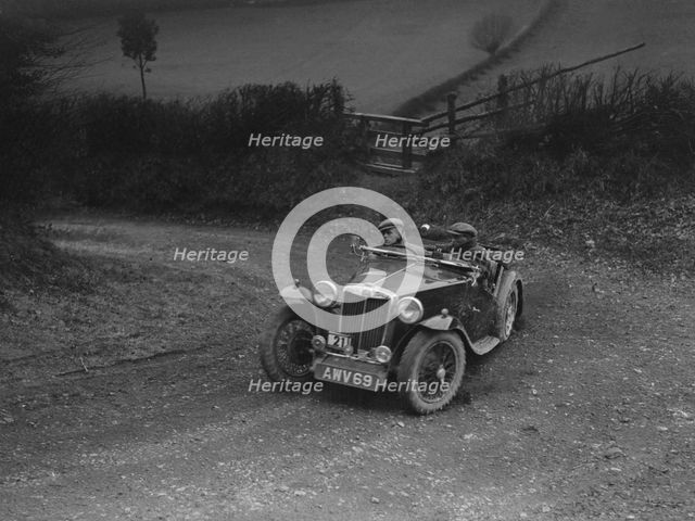 MG TA of HV Slade competing in the MG Car Club Midland Centre Trial, 1938. Artist: Bill Brunell.