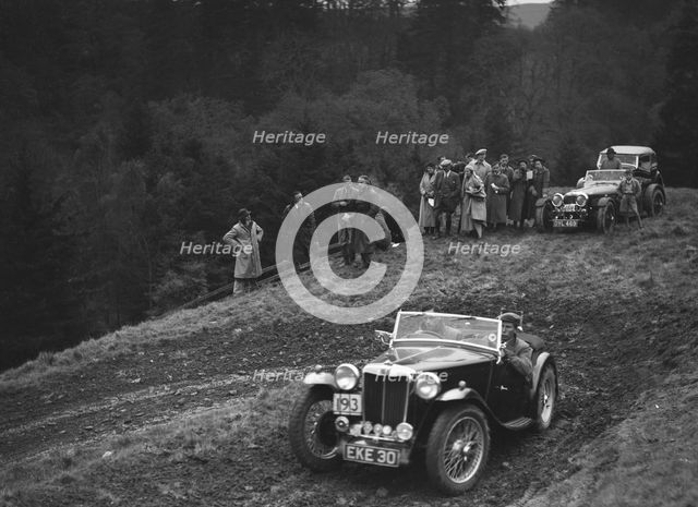 MG TA of JN Goodwin competing in the MCC Edinburgh Trial, Roxburghshire, Scotland, 1938. Artist: Bill Brunell.
