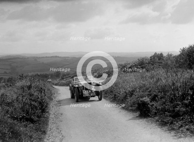 MG TA of JES Jones of the Cream Cracker Team competing in the MCC Torquay Rally, 1938. Artist: Bill Brunell.